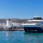 Ferry arriving at Parikia port, Paros, with the iconic windmill