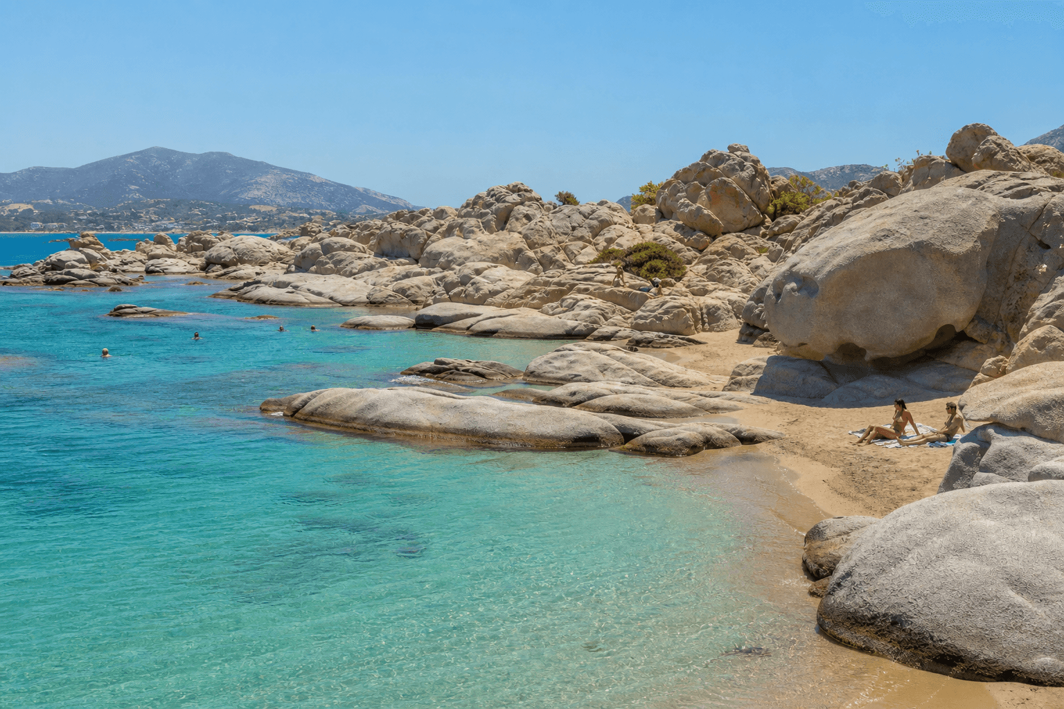 The unique granite rock formations and turquoise water of Kolymbithres beach, Paros.