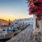 Naoussa fishing harbour and village on Paros at golden hour