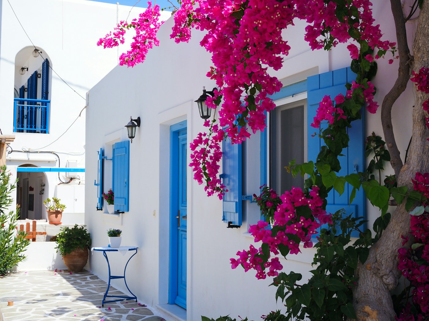Blue doors and bougainvillea in Antiparos town